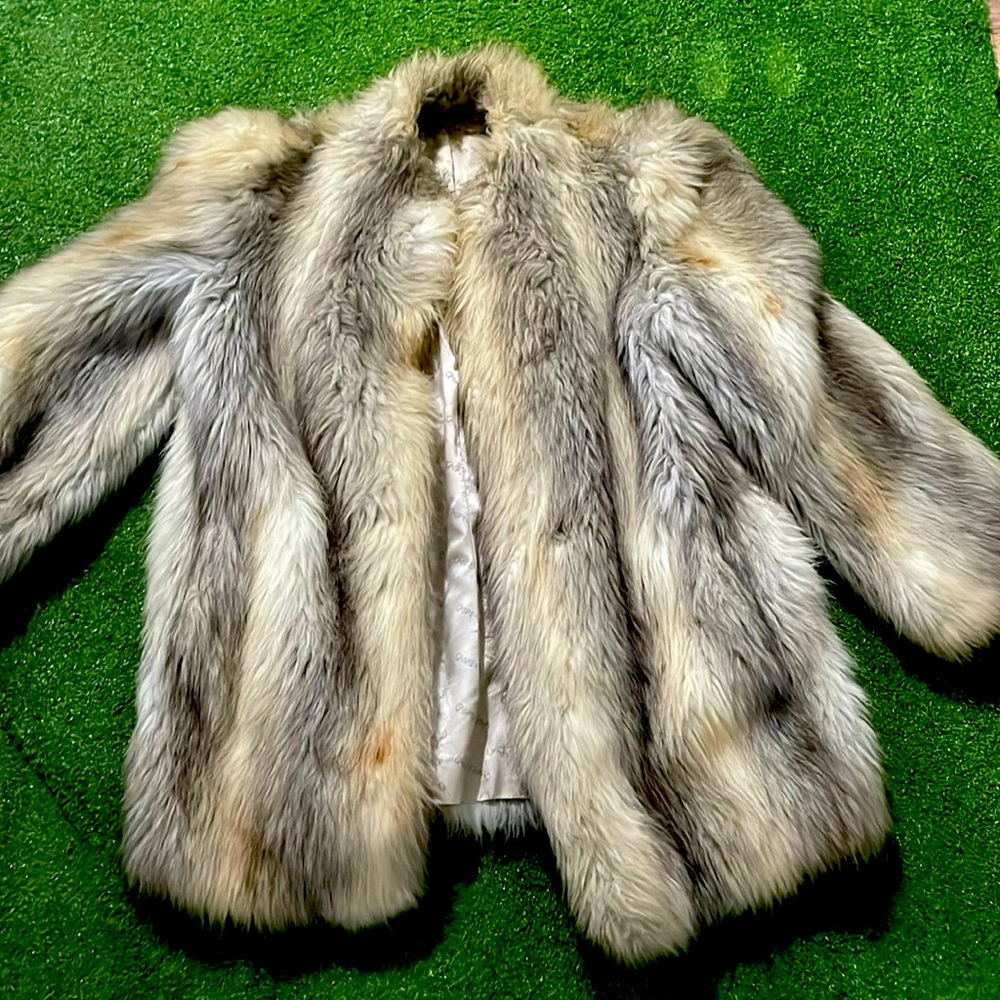 A medium faux fur coat in great condition from a smoke free home.